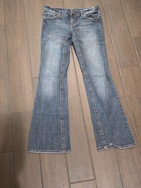 Vanity Distressed Blue Flared Jeans